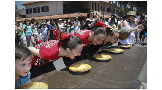 People participating in the pie eating contest