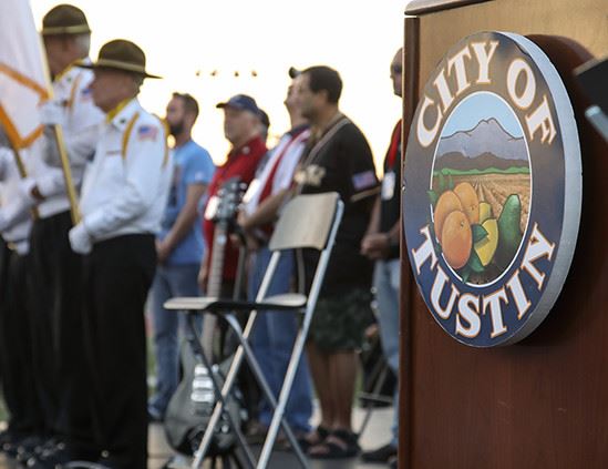 People at a stage celebrating 4th of July