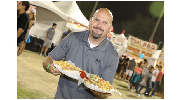 Man enjoys local fair food